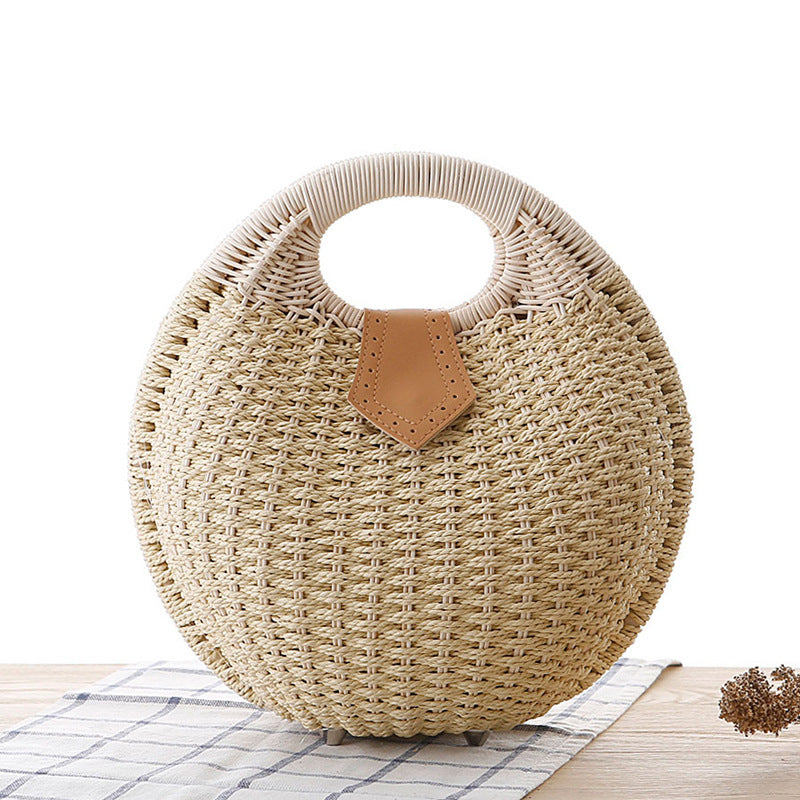 Sara – Runde Damenhandtasche aus Rattan