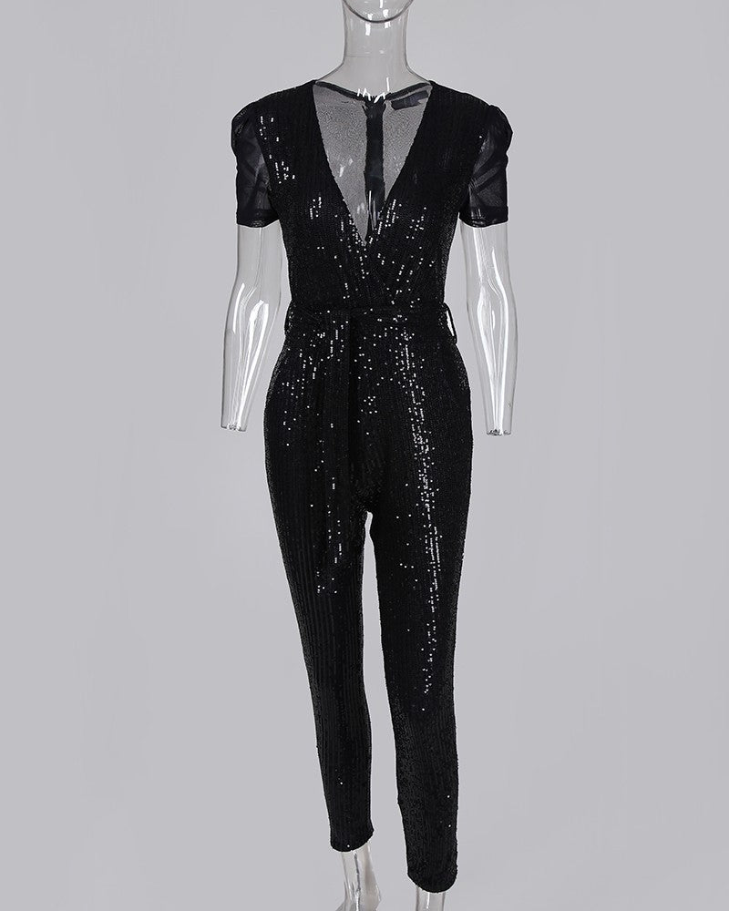 Joanne – Tief ausgeschnittener Pailletten-Jumpsuit