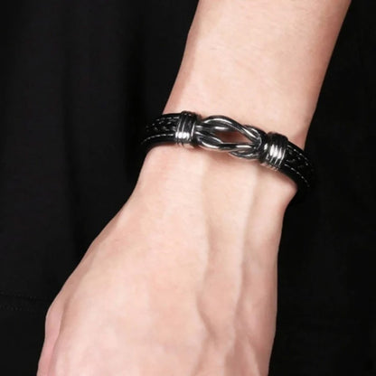 Nathan – Geflochtenes Herrenarmband aus veganem Leder mit Unendlichkeitssymbol und Edelstahlverschluss