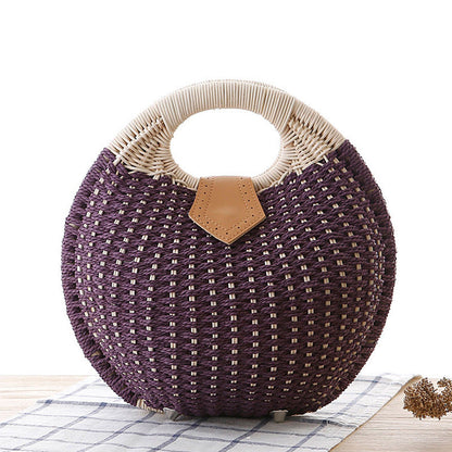 Sara – Runde Damenhandtasche aus Rattan