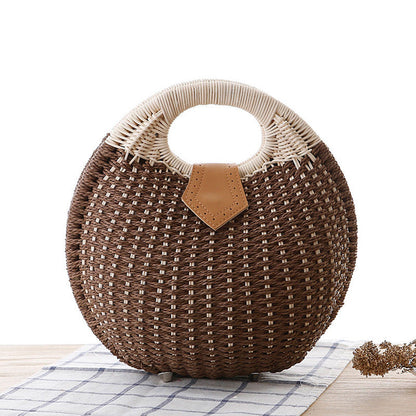 Sara – Runde Damenhandtasche aus Rattan